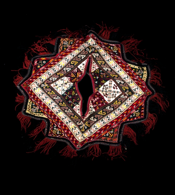 This is a finely embroidered Tekke child's bib. Rare,