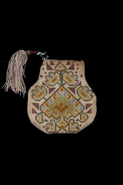 This is a rare 19th century Lakai gold purse. 