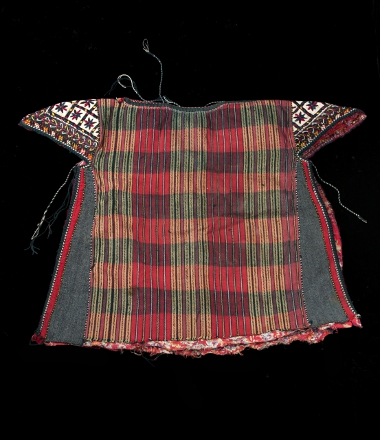 A Tekke Turkman child's smock with embroidered shoulders. 
