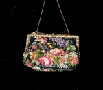 This is a French petite point hand made purse. Antique